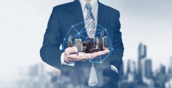 homem com cidade da mão em 3D